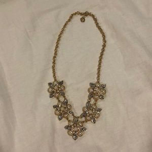 Beautiful gold necklace with diamonds and pearls.